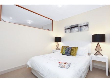 Stylish Two Bedroom Unit in the "Chocolate Factory" with Parking - Photo 3