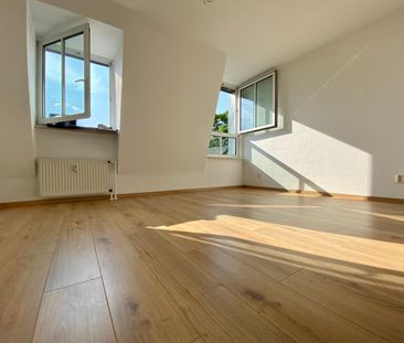Helle 2-Zimmer-Dachgeschosswohnung in Leipzig-Mölkau - inklusive TG... - Photo 3