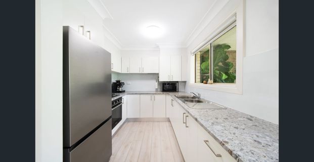 Light-Filled Upgraded Apartment with Exceptional Indoor–Outdoor Flow - Photo 1