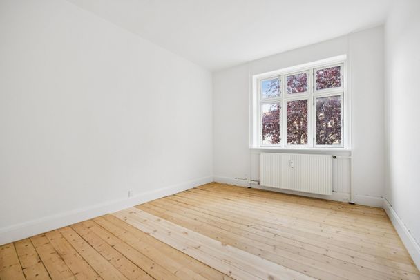 <b>Lys og indbydende 3-værelses lejlighed i Ø-gaden</b><br> - Photo 1