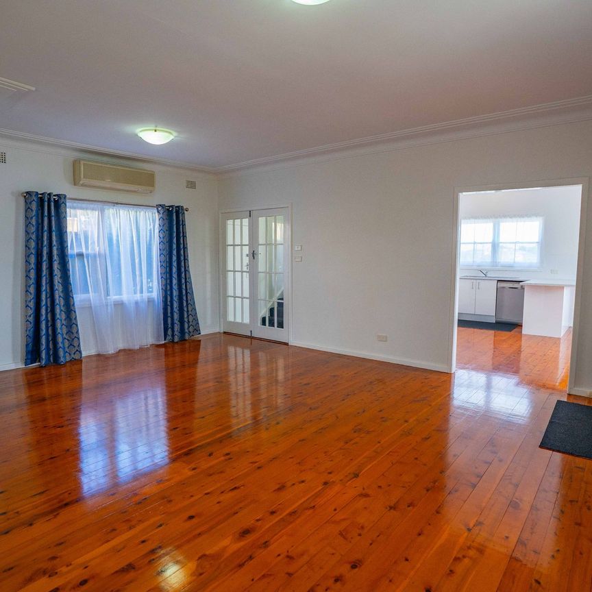 Beautifully Renovated Family Home in Sought-After Merewether Heights - Photo 1