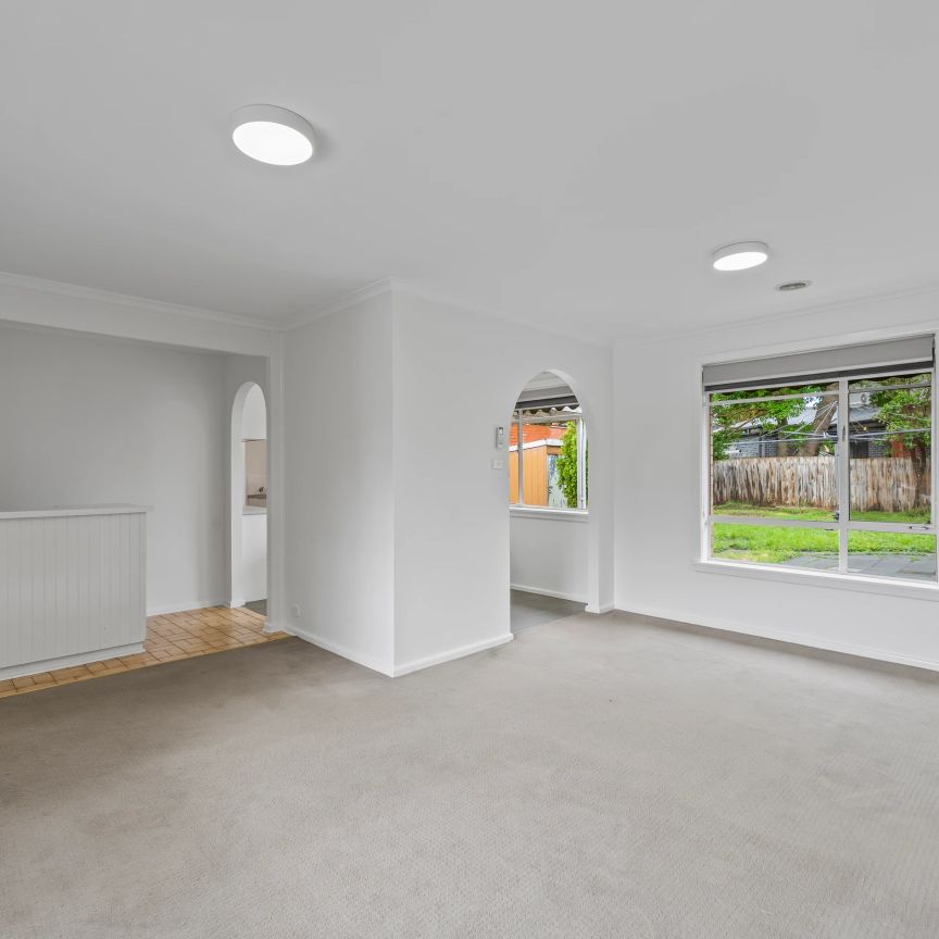 Freshly Painted & Light-Filled Family Home in a Prime Location! - Photo 1