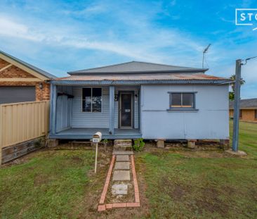 Two bedroom home with lawn maintenance included - Photo 2