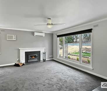 A beautifully renovated four-bedroom home - Photo 3
