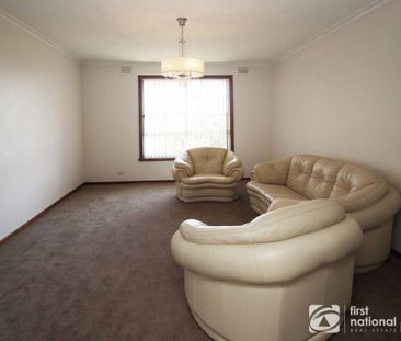 Sitting Amongst the Flowers - Photo 2