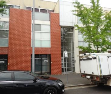 Contemporary Comfort Meets Prime Location! - Photo 1