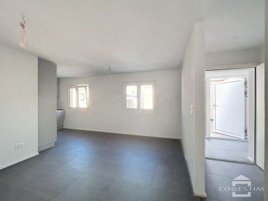Situé à 3 minutes à pied de la gare, appartement de 2,5 pièces rénové - Photo 1