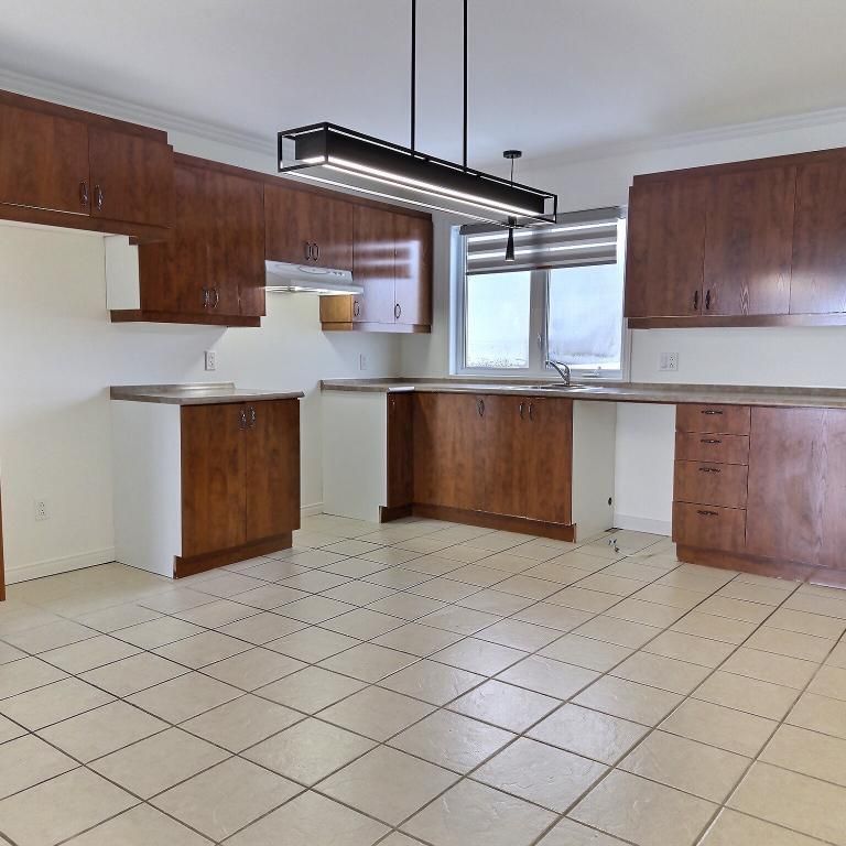 Logement 4 1/2 au rez de chaussé au 1 rue Belisle - Photo 1