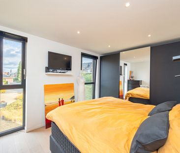 RECENT APPARTEMENT MET ZUID TERRAS EN GARAGE - Foto 1