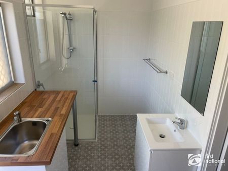 Recently renovated & centrally located unit in a small complex. - Photo 3