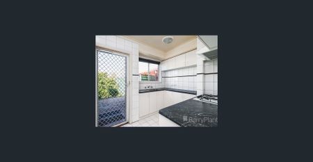 Perfectly Positioned Two-Bedroom Gem - Photo 2