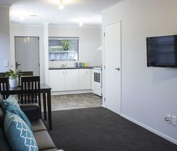 This is a modern, fully furnished studio unit. - Photo 1