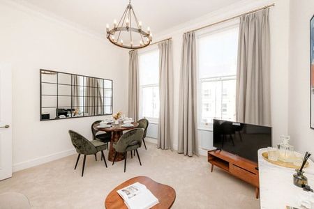 A smart two bedroom, two bathroom flat of just over 760 sq. ft situated on the second floor (with lift), located on the west side of Lexham Gardens that is separated by Marloes Road. Tenancy Length: Minimum 12 months EPC Rating C | Council Tax Band F - Photo 3