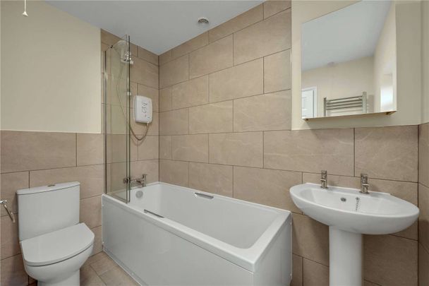 A charming semi detached country home offering generous proportions, bright interiors and attractive gardens, set in a peaceful rural position close to Farnham. - Photo 1