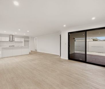 Modern Coastal Living Opposite Parklands! - Photo 1