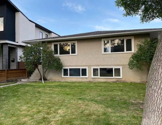Bright & Charming Mid-Century Upper Floor in Glenbrook! Available November 1st — 2 Bedrooms Main Floor - Photo 1