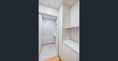 Modern Luxury Meets Homely Comfort in this Charming 2-Bedroom Rental in West Village! - Photo 2