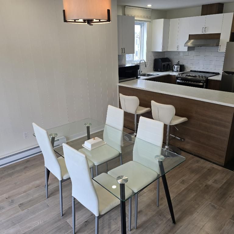 Grand 4 ½ de style condo entièrement rénové – Dernier étage d’un triplex à Sainte-Thérèse ! - Photo 1