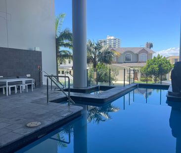 Modern Three-Bedroom Apartment in ‘Riva on Chevron’ - Photo 4