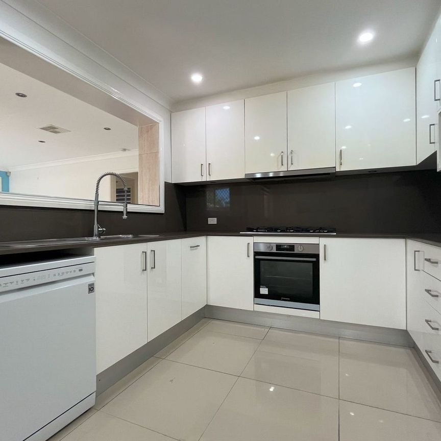 Spacious Four Bedroom Home! - Photo 1