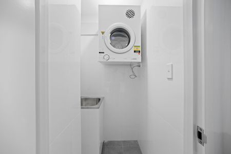 MODERN APARTMENT WITH BALCONY, PARKING, AND STORAGE IN A QUIET BOUTIQUE BLOCK - Photo 5