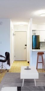 SKYLINE APARTMENTS - Photo 3