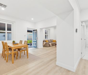 Updated Cottage in Prestigious Suburb - Photo 1