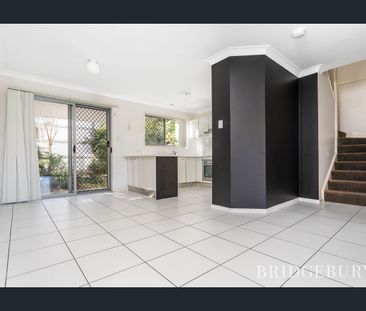Two storey living with a pool in the complex! - Photo 2