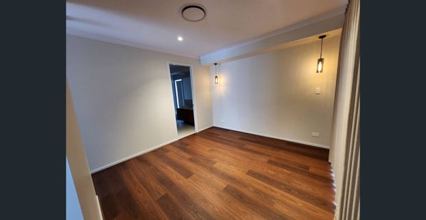 Designer Family Residence | 4 Bedrooms + Media Room | Ducted Air | Premium Finishes - Photo 1