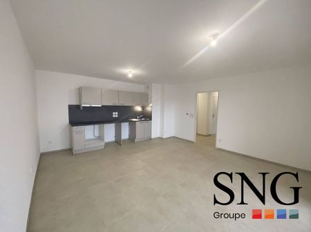 T3 AVEC LOGGIA + PARKINGS - Photo 2