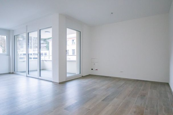 Lichtdurchflutete 2.5-Zi. Wohnung im 1. OG - Foto 1