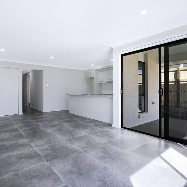 QUIET ESCAPE IN WEST END! A MUST INSPECT! - Photo 1