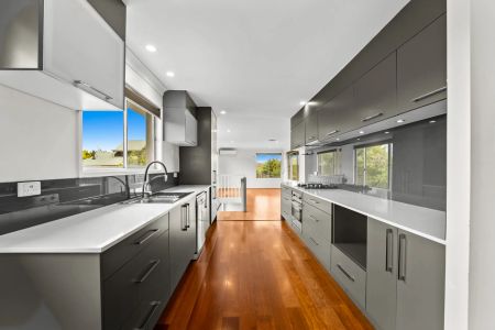 LOOKING FOR AN ELEVATED, MODERN FAMILY HOME? - Photo 4