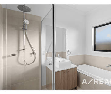 Modern 4-Bedroom Family Home in Weir Views - Photo 4