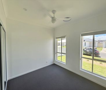 Brand New with Ducted Aircon! - Photo 2