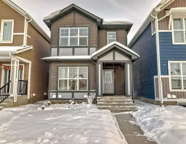 Cozy and very spacious legal basement suite for rent in Livingston NW | 144 Lucas Street Northwest, Calgary - Photo 1