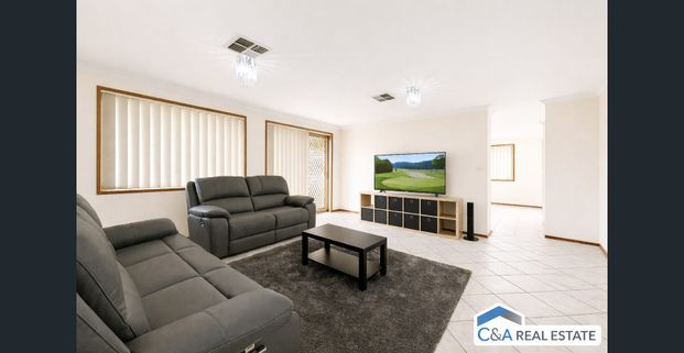 Spacious 4-Bedroom Home with Double Garage & More! - Photo 1