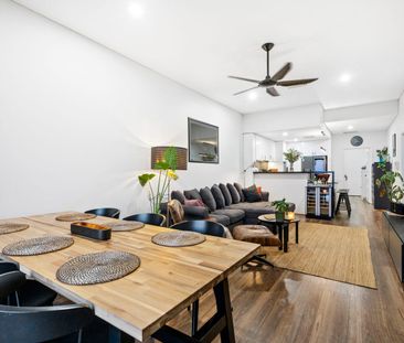 SPACIOUS TOP-FLOOR LIVING WITH STUNNING VIEWS! - Photo 1