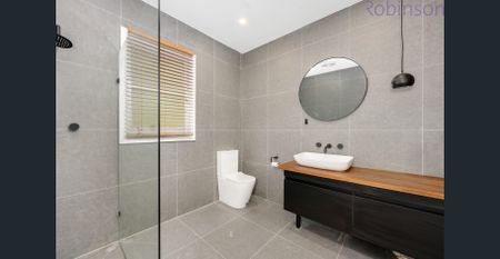 Three bedroom home with single garage, where the back yard lawn is mowed for you! - Photo 2