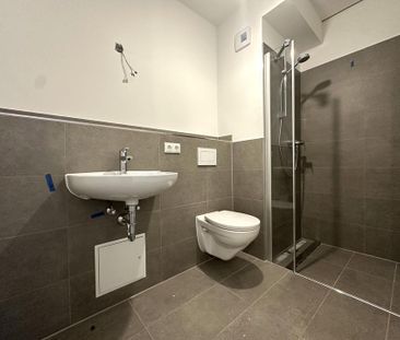 Neubau! Stilvolle 2-Zimmer-Penthousewohnung mit Terrasse & Einbaukü... - Photo 4