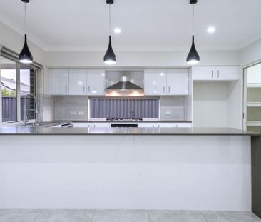 Neatly Presented Large Family Home - Photo 1