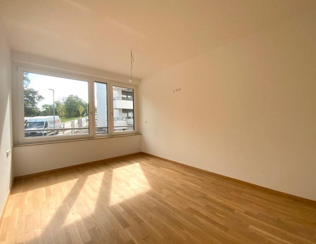 Großzügige 3-Zimmer-Neubauwohnung mit EBK und West-Terrasse - Foto 1