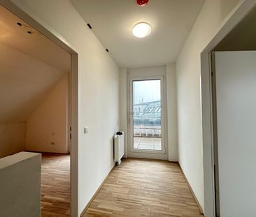 Modernes Wohnen in Brigittenau - 4-Zimmer-DG-Wohnung mit drei Freif... - Photo 3