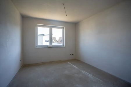 Eine Neubauwohnung mit einem sehr großen Garten und einer tollen Terasse - Photo 3