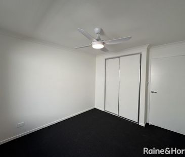 Modern Family Living in the Heart of Munno Para Downs - Photo 4