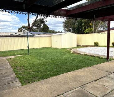 CONVENIENTLY LOCATED FAMILY HOME - Photo 5