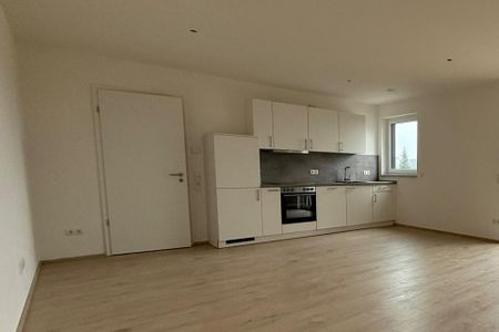 Bester Energiestandard! Moderne 1-Zi-Wohnung mit Balkon und Küche - KFW 40 NH - Photo 2