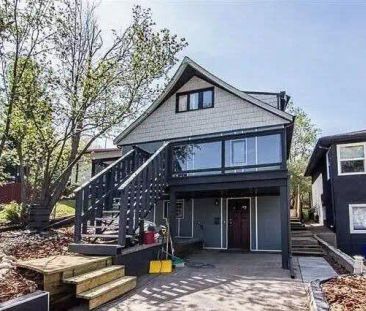 3-Level Character Home | Directly Across from Mill Creek Ravine — 2 Bedrooms House - Photo 1