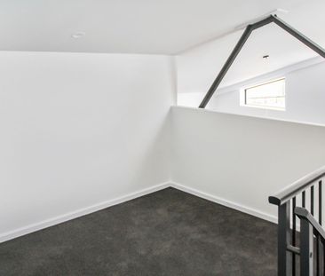 Industrial Loft Style Unit With Central Convenience & Water Views - Photo 3