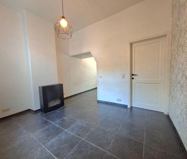 Rijwoning met tuin met uitweg - Foto 1